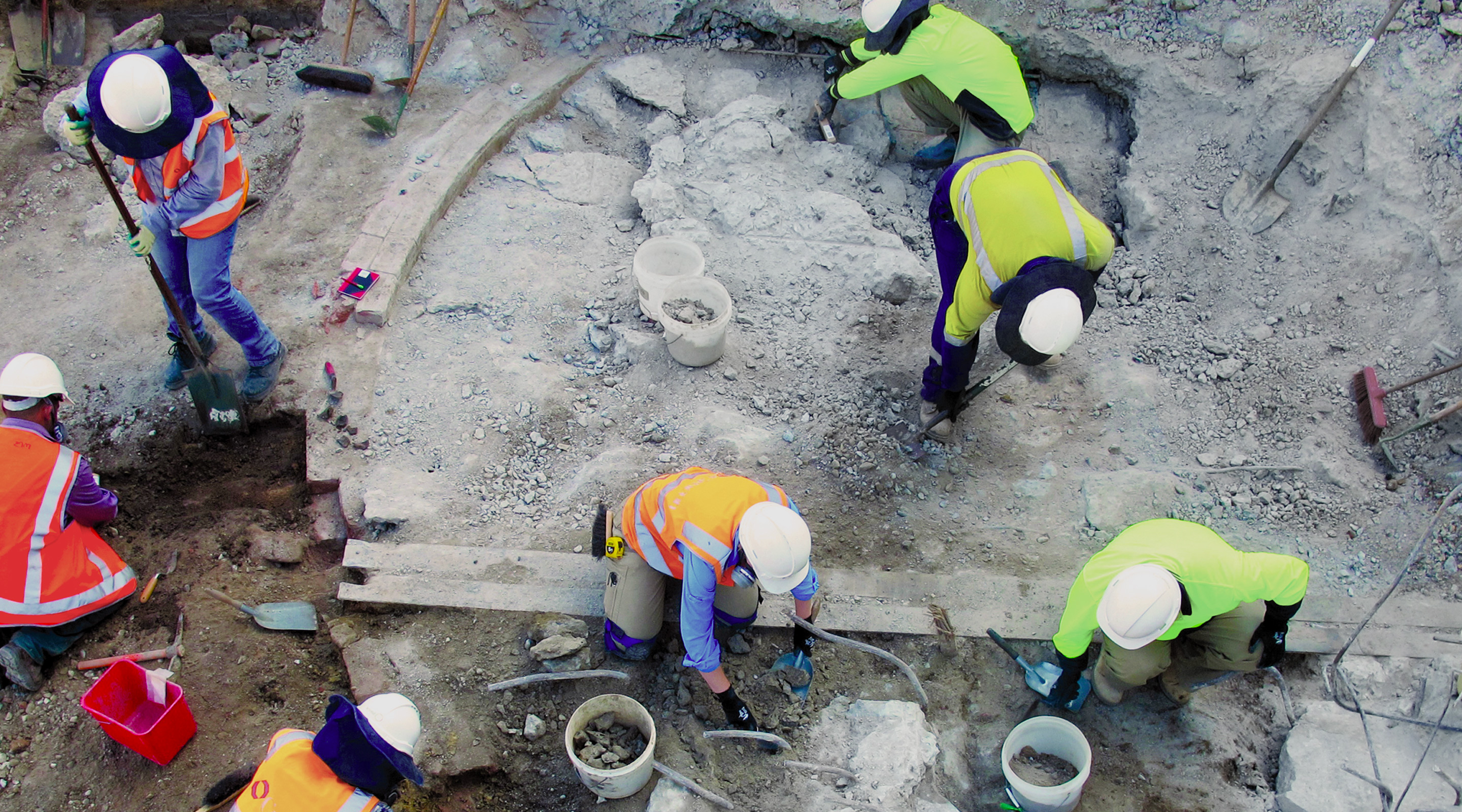 Archaeologists undertaking an excavation